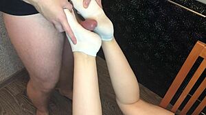Teen sockjob and foot worship in HD porn video with femdom