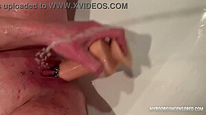 Busty amateur gets a handjob and pees on her clit